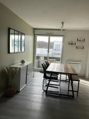 Coin salon dans l'établissement Appartement T3 proche circuit du Mans