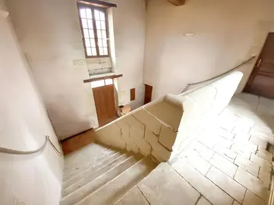 Coin salon dans l'établissement Maison charmante à Mouterre-Silly avec jardin privé