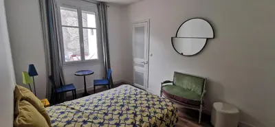 Un ou plusieurs lits dans un hébergement de l'établissement Appartement Jean Jaurès refait à neuf