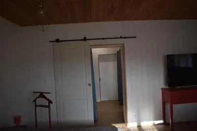 Télévision ou salle de divertissement dans l'établissement Gîtes du Franc Rosier
