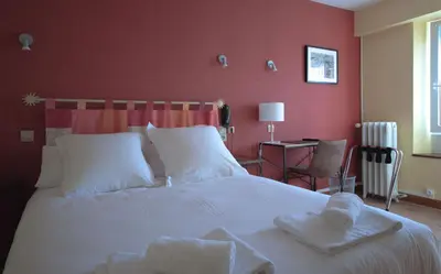 Un ou plusieurs lits dans un hébergement de l'établissement lhotel