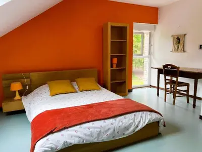 Un ou plusieurs lits dans un hébergement de l'établissement Gîte spacieux en Touraine, 8 pers, jardin privé, calme - FR-1-381-273