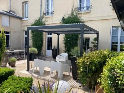 Jardin de l'établissement la boutique mj décoration vous propose de découvrir ses deux chambres d'hôtes