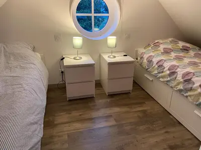 Un ou plusieurs lits dans un hébergement de l'établissement Appartement du Château de la Caillerie