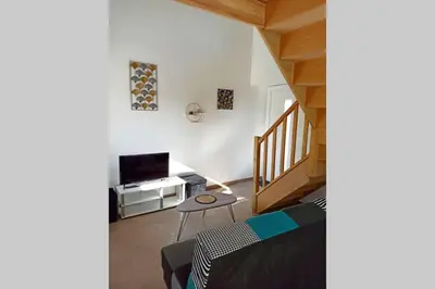 Télévision ou salle de divertissement dans l'établissement Petite maison de charme