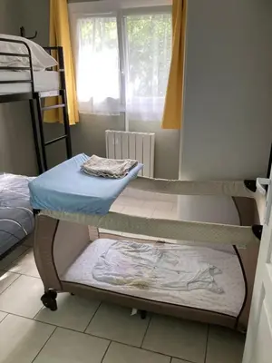 Un ou plusieurs lits dans un hébergement de l'établissement Maison au bord du Loir
