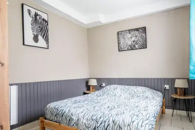 Un ou plusieurs lits dans un hébergement de l'établissement Maison au bord du Loir