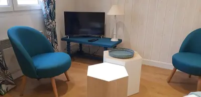 Télévision ou salle de divertissement dans l'établissement At home