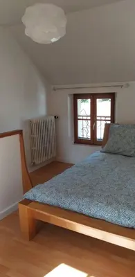 Un ou plusieurs lits dans un hébergement de l'établissement Maison cosy au cœur du Lochois