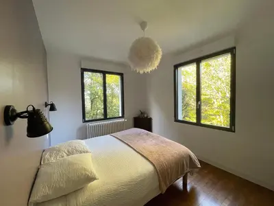 Un ou plusieurs lits dans un hébergement de l'établissement Les jardins de l'Hermitage