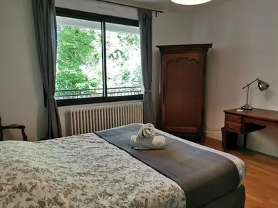 Un ou plusieurs lits dans un hébergement de l'établissement Les jardins de l'Hermitage