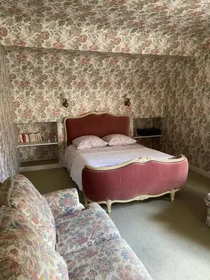Un ou plusieurs lits dans un hébergement de l'établissement Les jardins de l'Hermitage