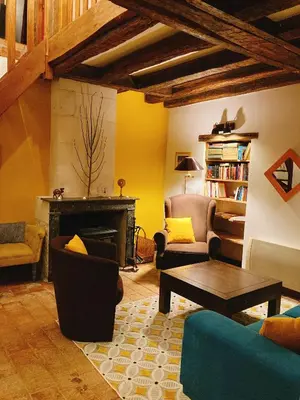 Coin salon dans l'établissement L’Alcalys - Maison de vacances au vert - Sans TV