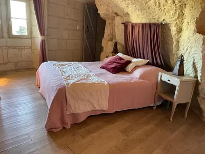 Un ou plusieurs lits dans un hébergement de l'établissement L’escale Troglo au bord de la Loire