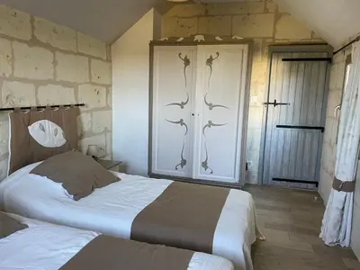 Un ou plusieurs lits dans un hébergement de l'établissement L’escale Troglo au bord de la Loire
