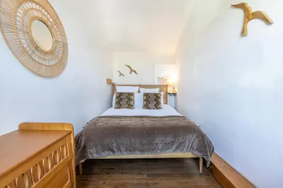 Un ou plusieurs lits dans un hébergement de l'établissement Loft de La Maison des Chalands