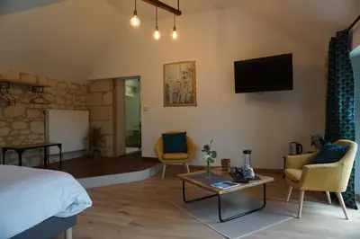 Télévision ou salle de divertissement dans l'établissement La Cotinière