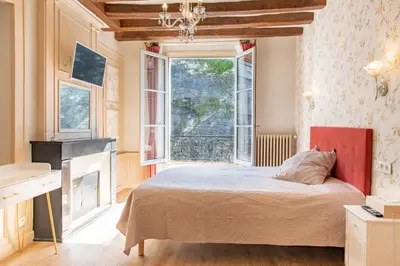 Un ou plusieurs lits dans un hébergement de l'établissement La Little Maison
