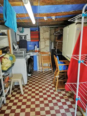 Un ou plusieurs lits superposés dans un hébergement de l'établissement Maison au calme avec terrasse et jardin