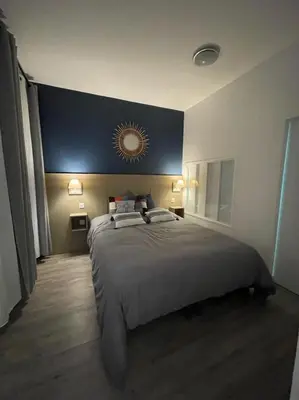 Un ou plusieurs lits dans un hébergement de l'établissement Logement entier: Appartement avec Terrasse Quartier de la Gare