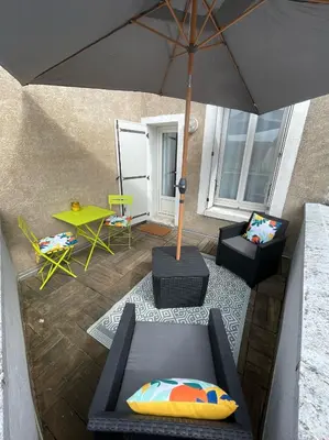 Coin salon dans l'établissement Logement entier: Appartement avec Terrasse Quartier de la Gare