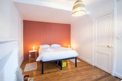 Un ou plusieurs lits dans un hébergement de l'établissement La Maison Lamartine Havre de paix dans le centre de Tours