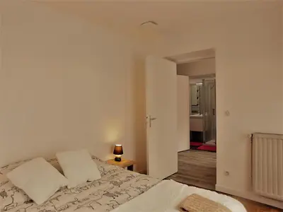 Un ou plusieurs lits dans un hébergement de l'établissement Appartement St Aignan sur Cher centre