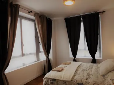 Un ou plusieurs lits dans un hébergement de l'établissement Appartement St Aignan sur Cher centre