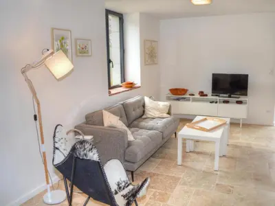 Coin salon dans l'établissement Gîte douillet à Luzillé avec terrasse, jardin, climatisation, proche Château de Chenonceau et Zoo de Beauval - FR-1-381-513