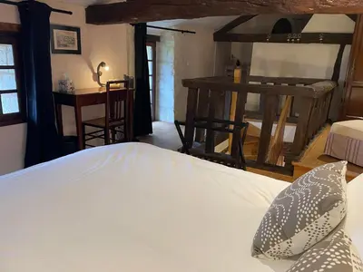 Un ou plusieurs lits dans un hébergement de l'établissement Le Cottage d'Eleanor gîte de charme avec spa Jacuzzi privé