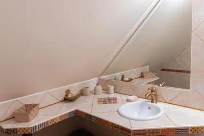 Salle de bains dans l'établissement Maison Camilia