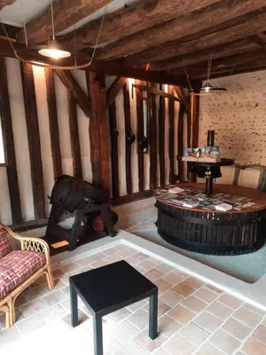 Coin salon dans l'établissement La Maison Genevier - Chambre La Family