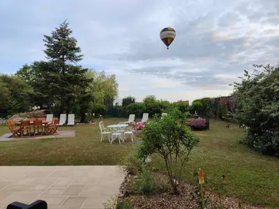 Jardin de l'établissement La Maison Genevier - Chambre La Family