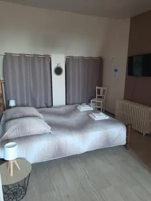 Un ou plusieurs lits dans un hébergement de l'établissement La Maison Genevier - Chambre Doréline