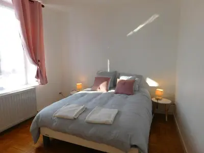 Un ou plusieurs lits dans un hébergement de l'établissement Appartement situé en centre ville de Saint Aignan