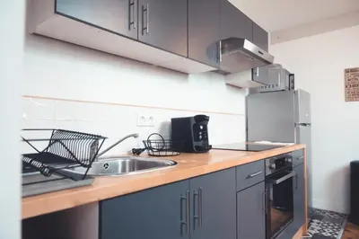 Cuisine ou kitchenette dans l'établissement L'Âme de l'Artiste - Quartier Velpeau