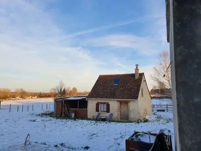 L'établissement Gite de charme au coeur de la forêt en hiver