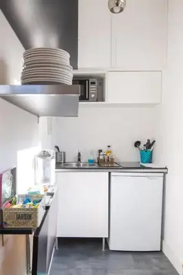 Cuisine ou kitchenette dans l'établissement «AU VINCI BLEU» Cosy - Centre-ville Amboise