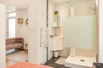 Un ou plusieurs lits dans un hébergement de l'établissement Maison tourangelle chic & cosy avec cour