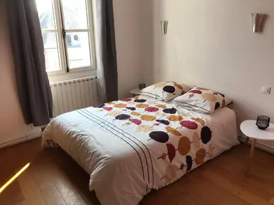 Un ou plusieurs lits dans un hébergement de l'établissement Agréable maison de bourg aux portes de TOURS