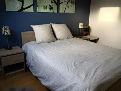Un ou plusieurs lits dans un hébergement de l'établissement Gîte Maison de Sophie