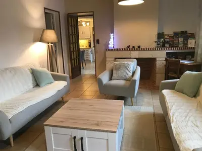 Coin salon dans l'établissement Gîte Maison de Sophie