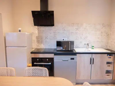 Cuisine ou kitchenette dans l'établissement Les Clématites de Saint-Aignan 8p, 7min du Zoo