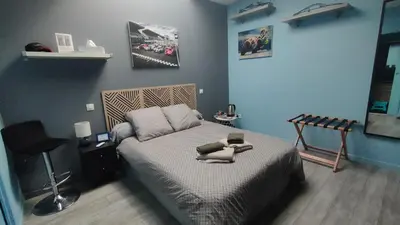 Un ou plusieurs lits dans un hébergement de l'établissement LOFT Descartes