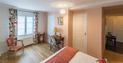Un ou plusieurs lits dans un hébergement de l'établissement Couette et café Saumur