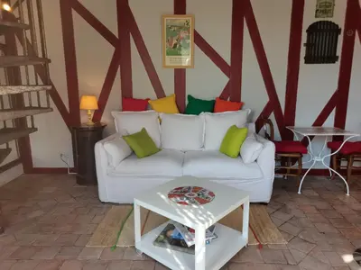 Coin salon dans l'établissement Charmant gîte duplex du bon accueil