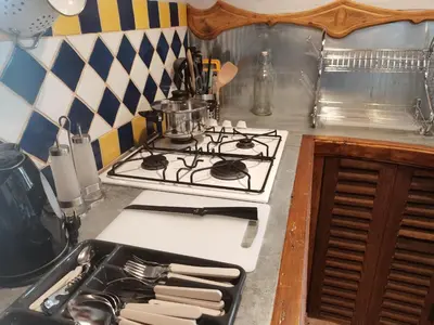 Cuisine ou kitchenette dans l'établissement Charmant gîte duplex du bon accueil