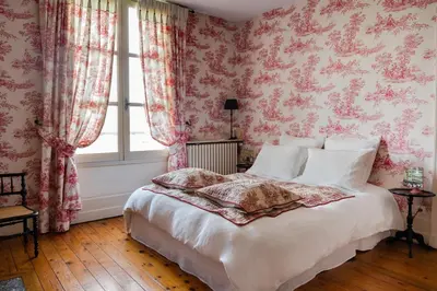 Un ou plusieurs lits dans un hébergement de l'établissement MAISON HULOTTE