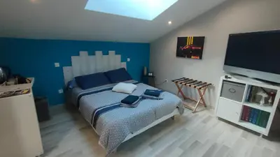 Un ou plusieurs lits dans un hébergement de l'établissement LOFT 2 Descartes