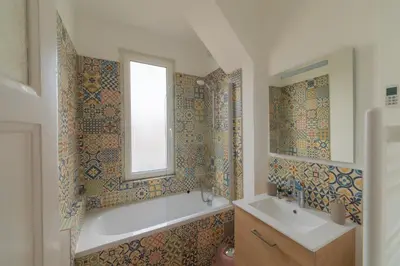 Salle de bains dans l'établissement Appartement Cosy avec garage privé